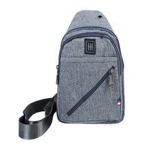 Load image into Gallery viewer, Canvas Crossbody Sling Bag with Headphone Jack – Durable &amp; Stylish
