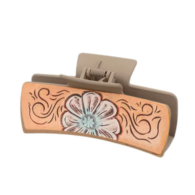 Nollia desert flower hair claw clip with floral design on white background