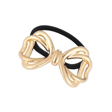 Nollia gold metal bow hair tie on white background