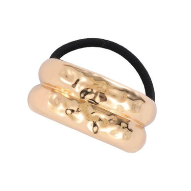 Nollia hammered gold dome hair tie on white background