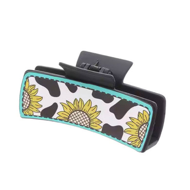Nollia sunflower cow print hair claw clip on white background
