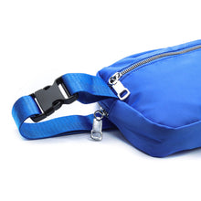 Load image into Gallery viewer, Nollia unisex blue nylon rectangle belt bag laying flat 
