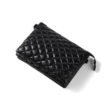 Load image into Gallery viewer, Black quilted nylon purse with silver D top view
